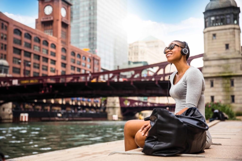 City break in Chicago - Woman relaxing at lunch time