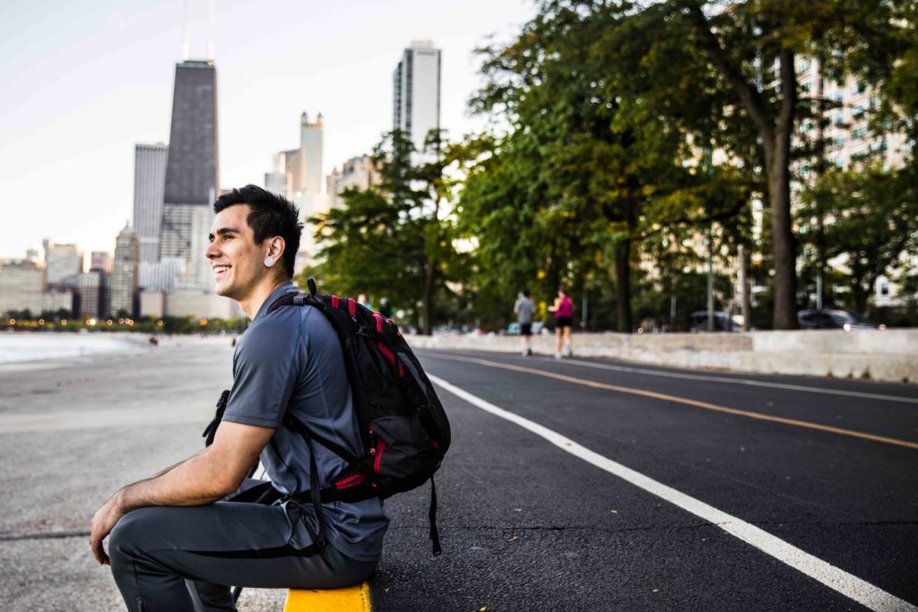 Cyclist taking a city break afterwork on the way home